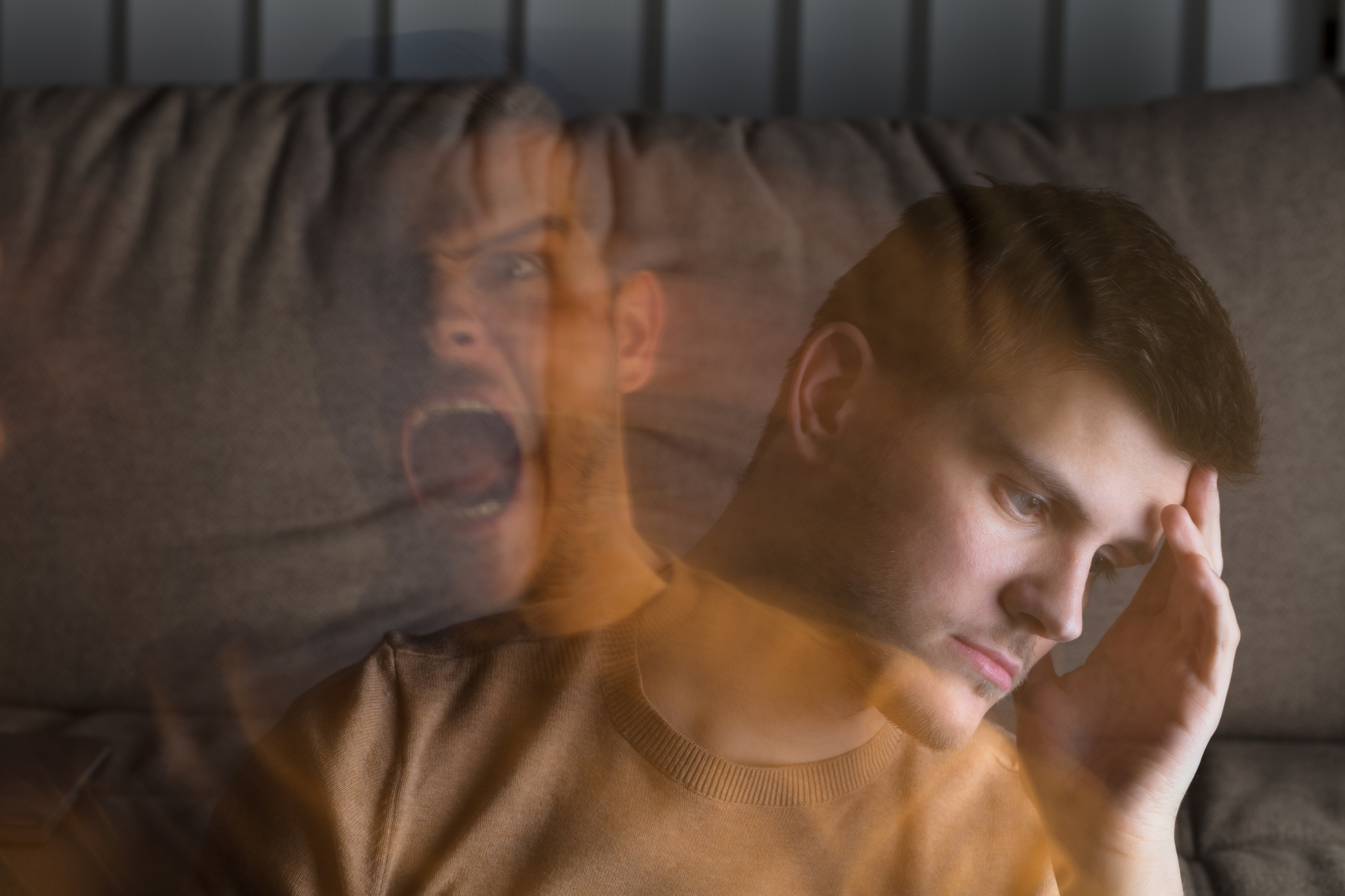 Multi Exposure Of Young Angry And Stressed Man At Home